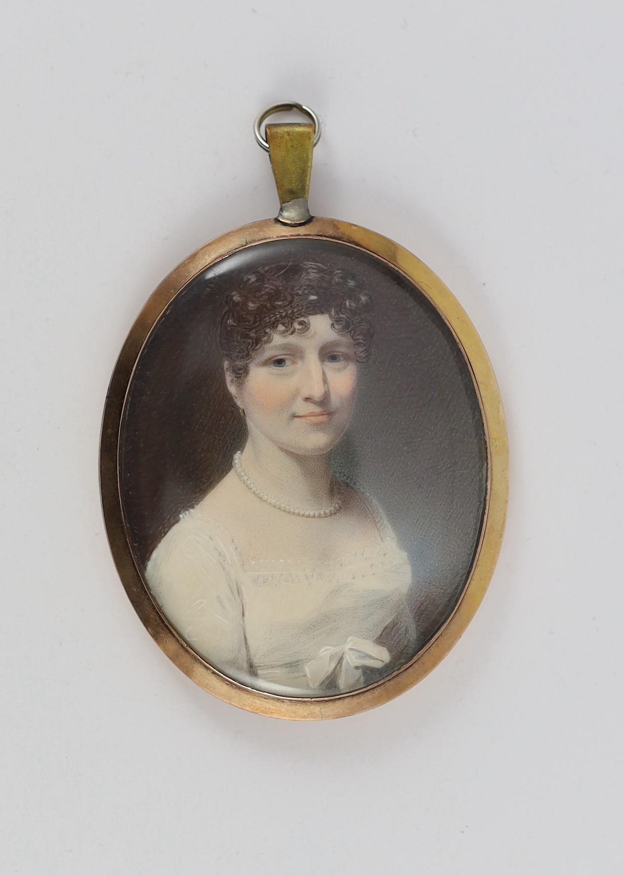 Attributed to George Patten (British, 1801-1865), Portrait miniature of a lady, watercolour on ivory, 6.5 x 5.25cm, gold hair back frame